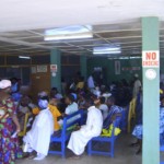 Patients wait outside Kintampo Municipal Hospital in Kintampo, Ghana, where malaria is treated. [Photo credit: Frank Baiden]